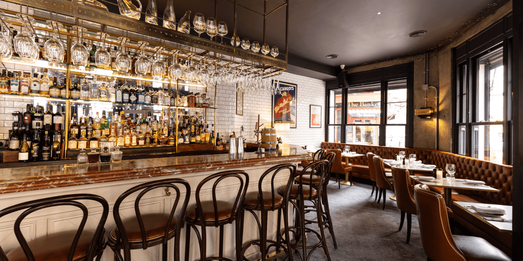 Pichet restaurant stylish bar interior with bottle display and ambient lighting
